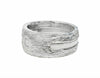Wide Platinum man's band, textured like bark, set with three square diamonds.