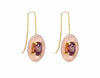 Drop earrings with yellow gold wires and rose gold bowls. Bright brandy coloured faceted gems prong set in each bowl.