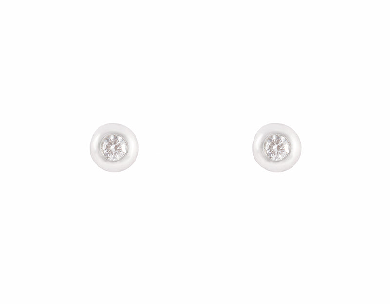 Diamond studs in platinum.
