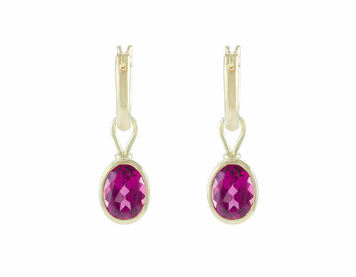 Green gold hoop earrings with green gold drops and bright raspberry pink oval gems.