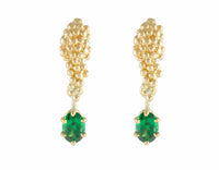 Studs in yellow gold like a bunch of grapes. Green oval gems hanging from the ends. 